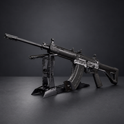 E&L Jianshe QBZ191 black non-firing building block display model with its display stand on a charcoal background